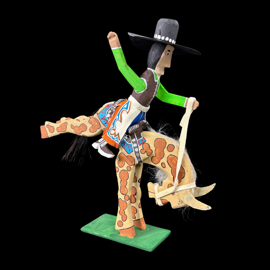 Bucking Bronco Rider by Delbert Buck
