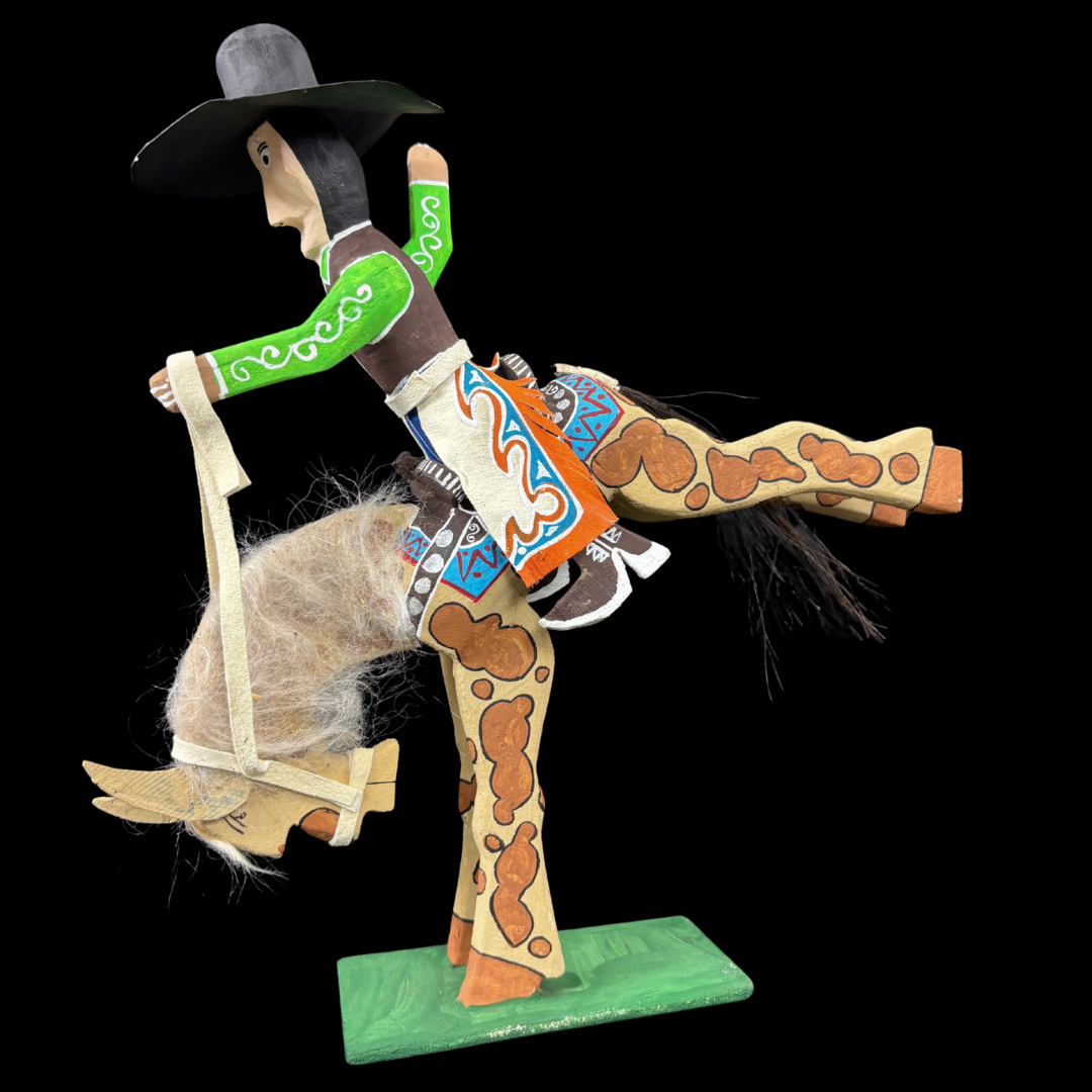 Bucking Bronco Rider by Delbert Buck