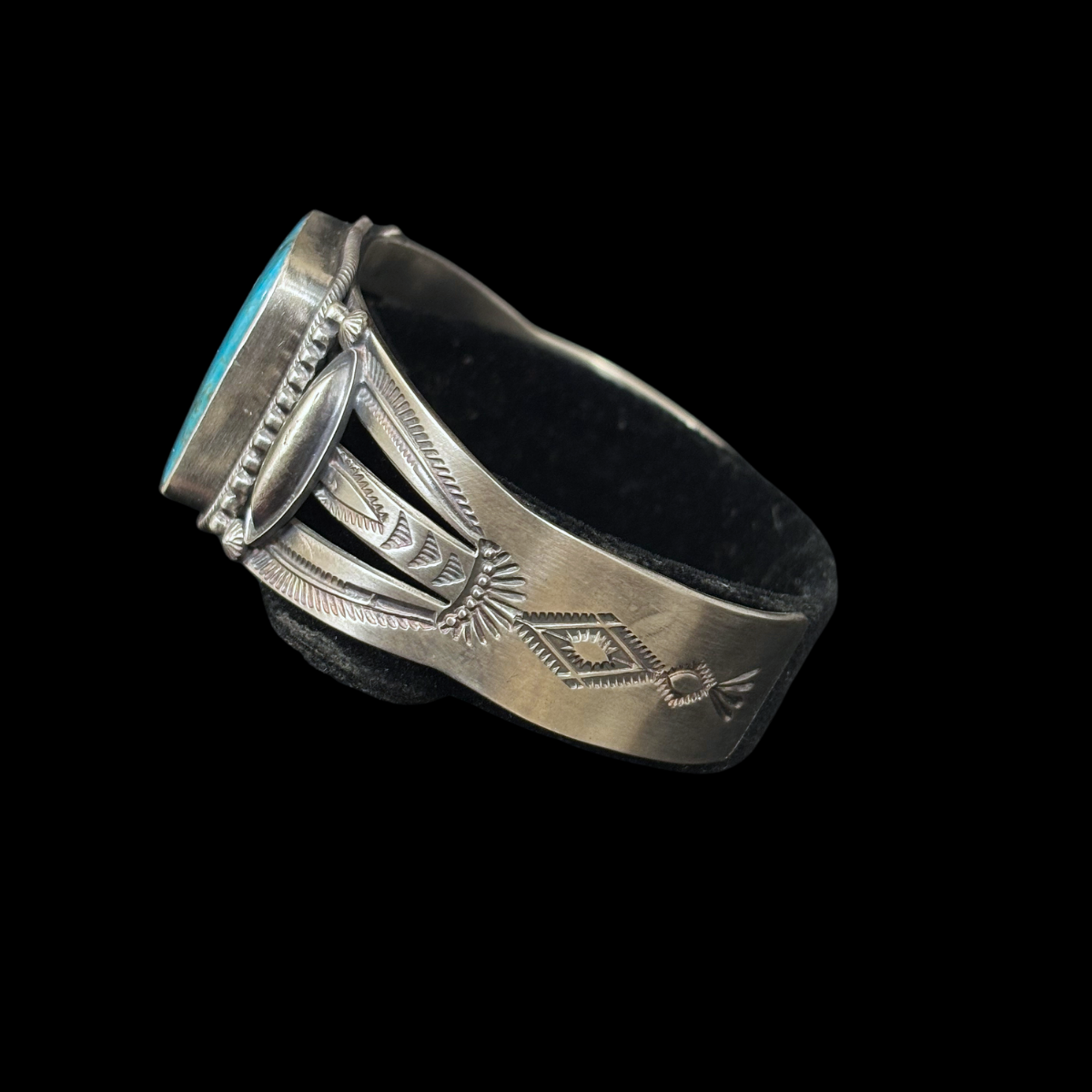 Turquoise and Stamped Sterling Silver Bracelet by Stanley Parker