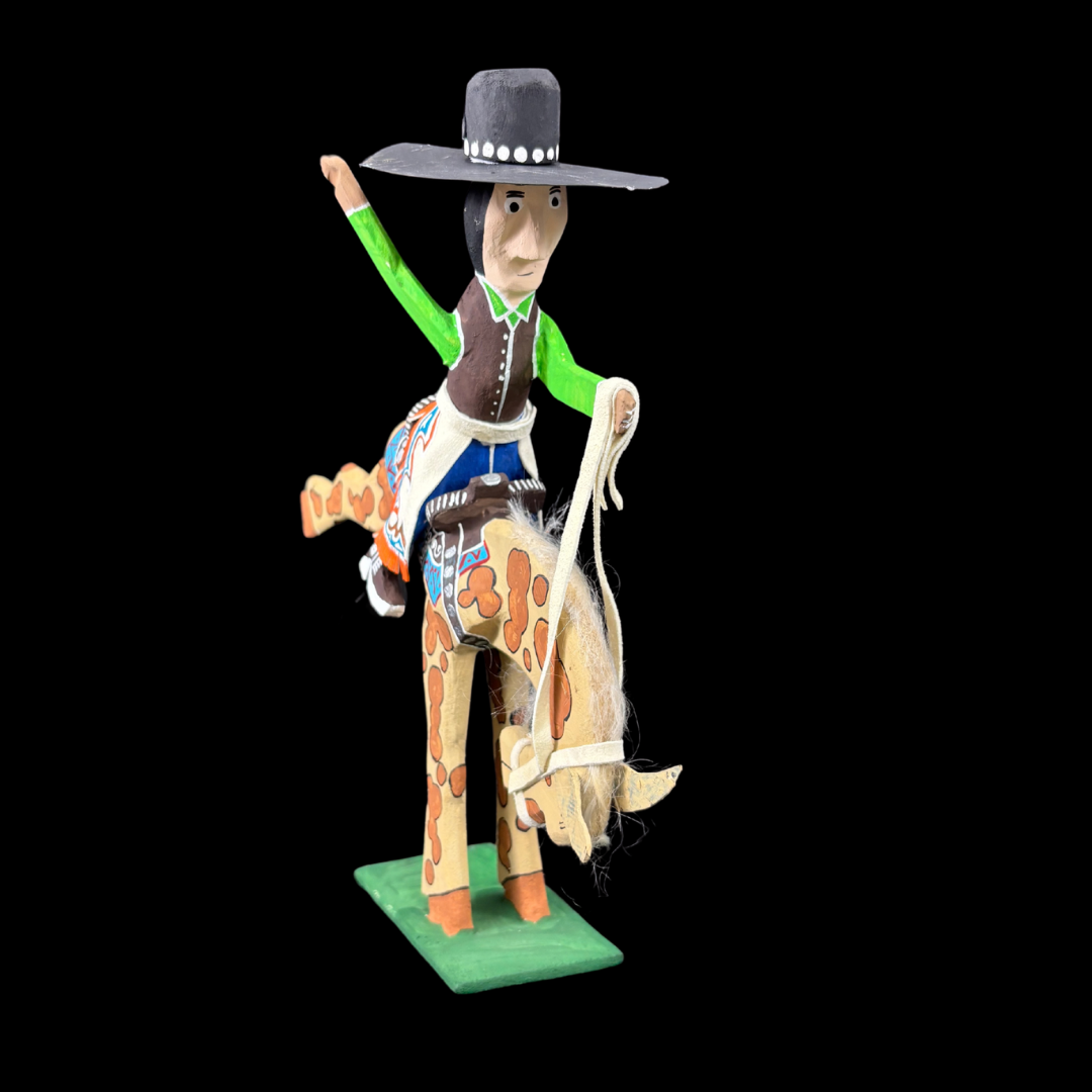 Bucking Bronco Rider by Delbert Buck