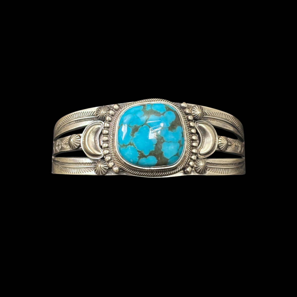 Turquoise and Stamped Sterling Silver Bracelet by Stanley Parker