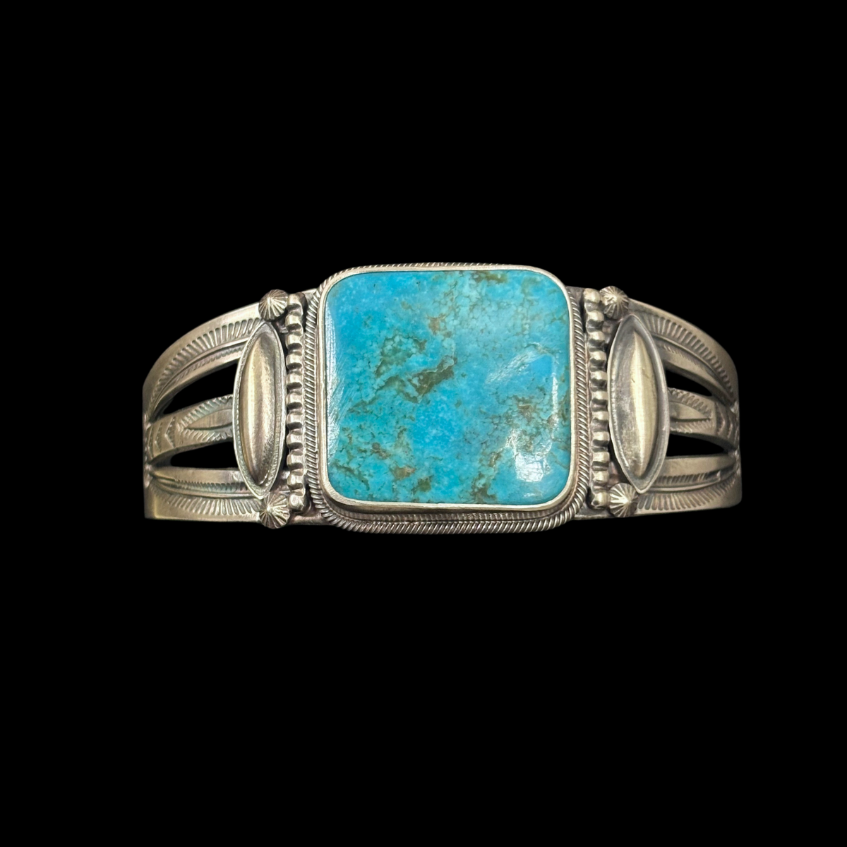 Turquoise and Stamped Sterling Silver Bracelet by Stanley Parker